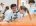 High School Information Night, students in science lab in lab coats
