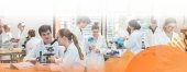 High School Information Night, students in science lab in lab coats